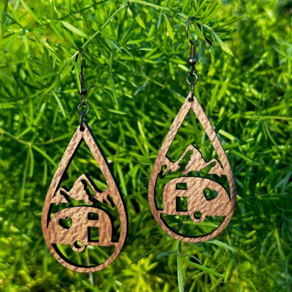 Earrings hanging in a bush.