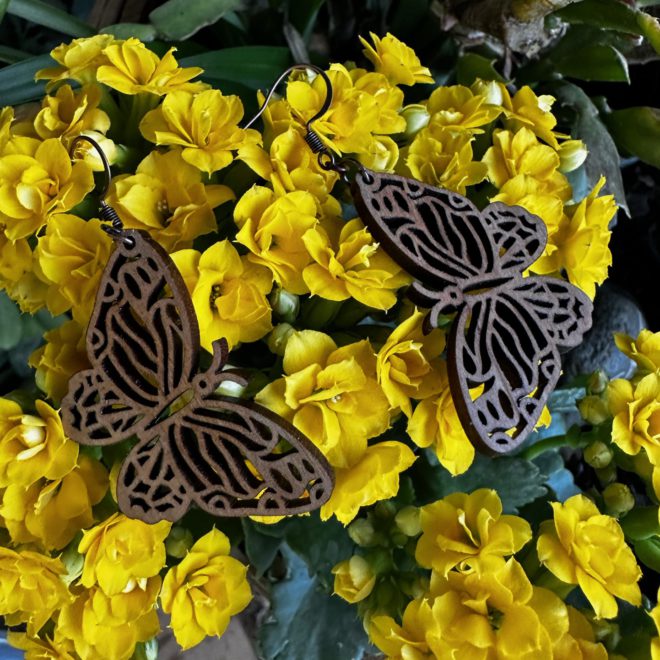 Walnut buterfly's on yellow flowers.